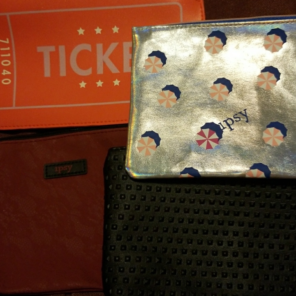 4 like new ipsy bags!!